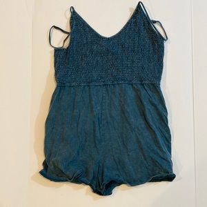 Turquoise Romper. Acid washed coloring.